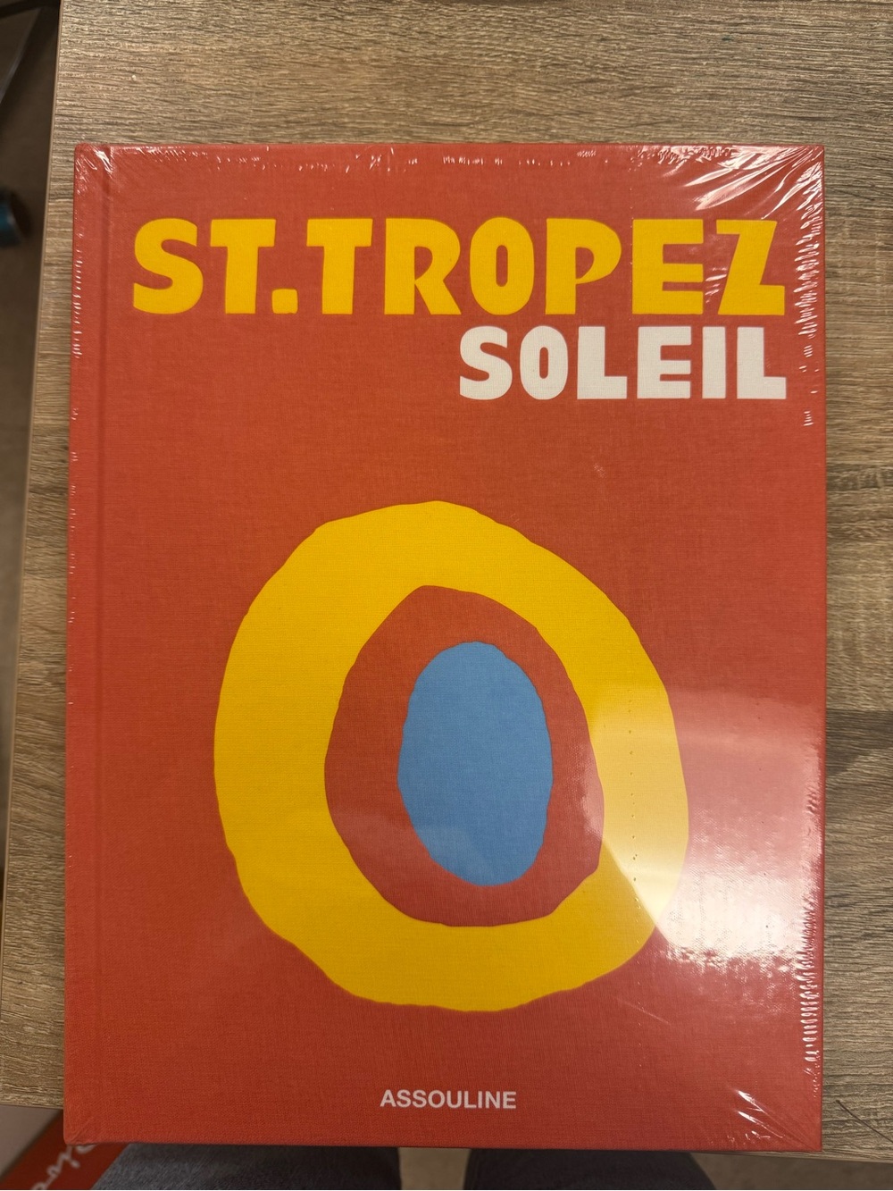 Assouline ST. TROPEZ SOLEIL Red Cover with Yellow and Blue Graphic